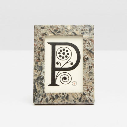 The Corsica Frame Collection features a rectangular gray marble frame displaying a decorative black letter "P" on a white background—an elegant piece to elevate your home decor.