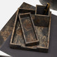 The Pigeon and Poodle Chandler Mappa Burl Desk Set, with its unique wooden style, features a pen holder, a rectangular tray, and a square tray arranged on a gray surface. A pen nestles neatly in the pen holder.