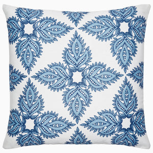 The John Robshaw Maira Indigo Outdoor Pillow showcases a symmetrical indigo leaf pattern on a crisp white background, ideal for elevating your beach decor.