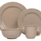 A set of Juliska Puro Taupe Collection dinnerware consisting of two plates, a bowl, and a mug.