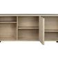 The La Paz Buffet is a light wood sideboard with three compartments, each with an adjustable shelf. Two wood doors open to reveal spacious interior storage.