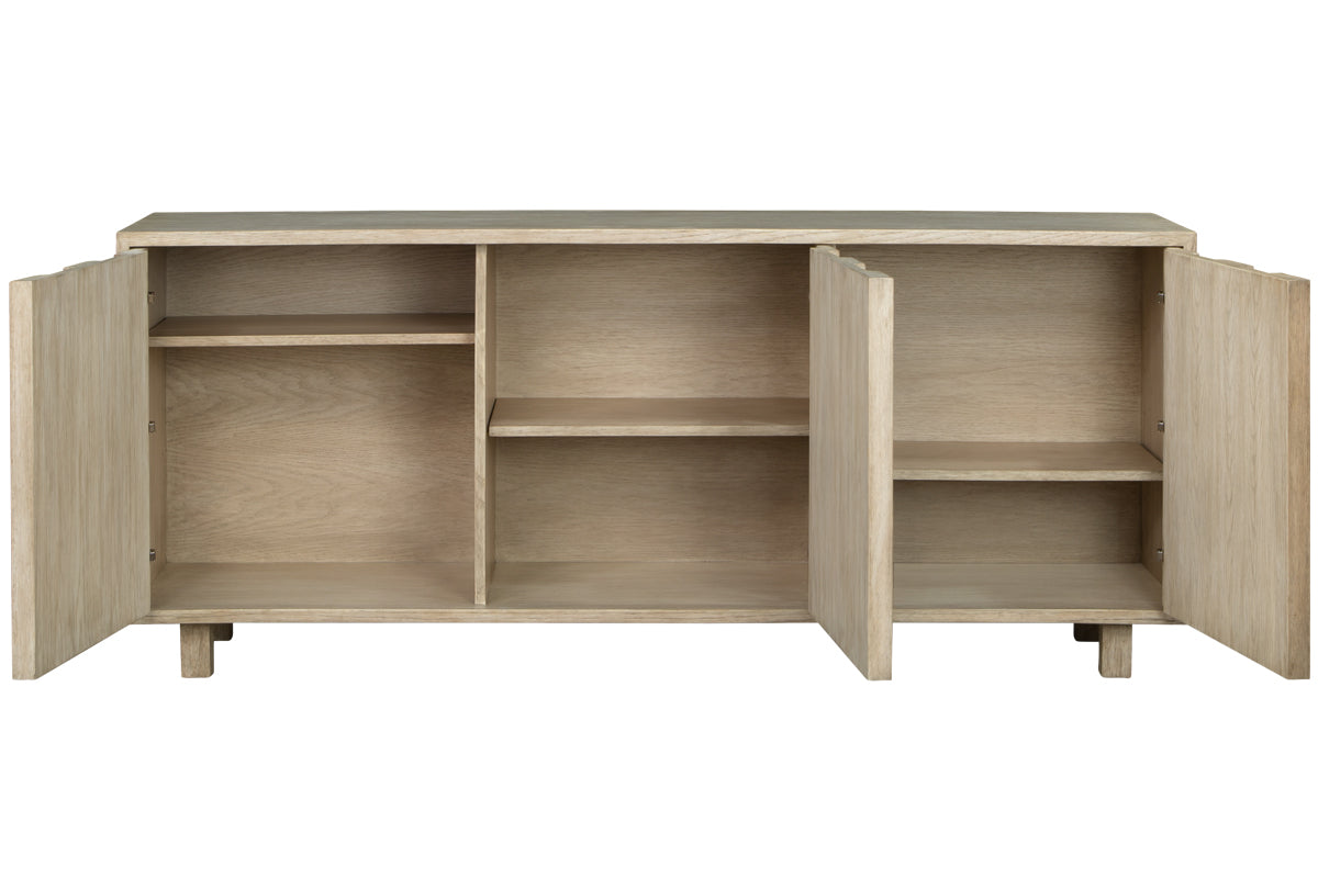 The La Paz Buffet is a light wood sideboard with three compartments, each with an adjustable shelf. Two wood doors open to reveal spacious interior storage.