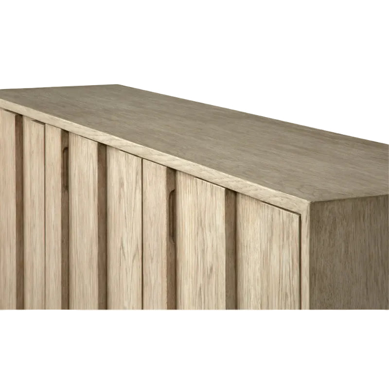 A close-up view of the La Paz Buffet, featuring light wood construction, vertical groove detailing on the doors, and an adjustable interior shelf.