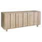 The La Paz Buffet is a wooden sideboard with a light finish, four vertical paneled doors, a roomy wood case, and simple rectangular legs.