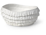 A white ceramic bowl with a textured, layered fringe design on its exterior is part of the elegant Vivian Collection. This piece is crafted from durable porcelain for lasting beauty.