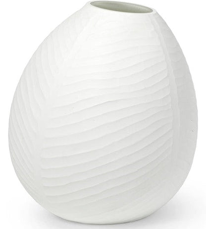 A Vermont Vase Collection piece, white and oval-shaped, features a beautifully textured surface and a narrow opening, making it one of those unique pieces that stand out.