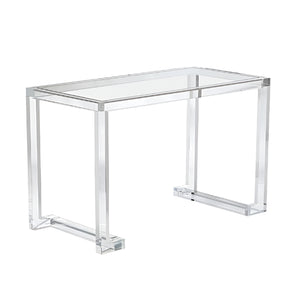 The Ava Acrylic Desk features a minimalist, modern design with transparent legs and tabletop, serving as a striking statement piece against a white background.