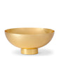 The AERIN Sintra Bowl Collection features a shiny, golden metallic bowl with a wide, shallow design and a small cylindrical base, creating an elegant serving dish aesthetic. Its sophisticated high-polish finish seamlessly complements any Mid-Century Modern décor.