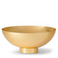 This elegant serving dish from the AERIN Sintra Bowl Collection boasts a shiny, gold-colored metallic bowl with a small pedestal base, featuring a sophisticated high-polish finish against a plain white background.