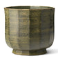 A green and brown AERIN Delmara Cedar cachepot featuring vertical textured patterns, a hand-applied glaze, and a rounded base.