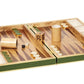 A luxury AERIN Croc Leather Backgammon Set with wooden checkers and dice, opened and placed on a surface. The playing pieces are arranged at the starting position of the game, making it a perfect addition to any board games collection.