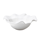 This white ceramic bowl from the Beatriz Ball VIDA Havana Serveware Collection showcases a wavy rim and a glossy finish, making it ideal for both indoor and outdoor entertainment.