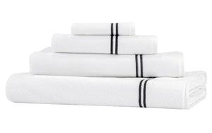 A neatly stacked set of white towels in various sizes with black stripes near the edges on a white background, featuring double border embroidery from the Frette Classic Bath Collection, White/Grey, crafted from highly absorbent cotton terry.