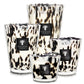 Four Baobab Collection Pearls Black Candles with black and white marbled patterns and black labels are displayed in varying sizes against a white background, including the luxurious Black Pearls variety.