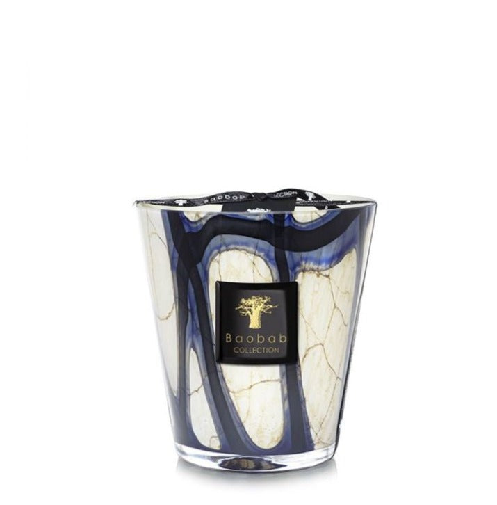 A Baobab Collection Stones Lazuli Candle in a glass jar with a marble-like blue and cream design, infused with the enticing scents of cardamom and sea salt, featuring a black label that reads "Baobab Collection.