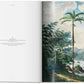 Open book displaying a botanical illustration of a tall palm tree by a river with mountains in the background, reminiscent of an Amazonian journey. The left page contains text, possibly extracted from **The Book of Palms**.