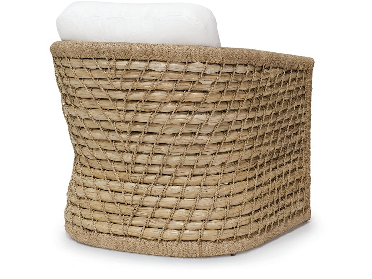 The Capitola Lounge Chair is a square-shaped, woven rattan chair with a grid pattern made from natural seagrass, topped with a white cushion.