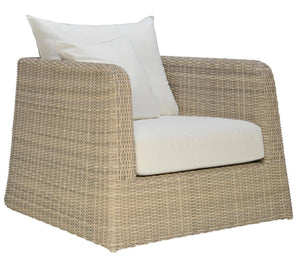 The Zeya Outdoor Lounge Chair features a weather-resistant beige wicker frame with plush white seat and back cushions, displayed at an angle on a white background to highlight its architectural elegance.