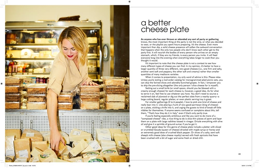 A woman with blonde hair shops for cheese at a market. Stacks of various cheeses are displayed on a counter, ready for her to create one of the recipes from Nothing Fancy: The Art of Having People Over. Text on the right page provides tips for assembling a better cheese plate with low-effort dishes.