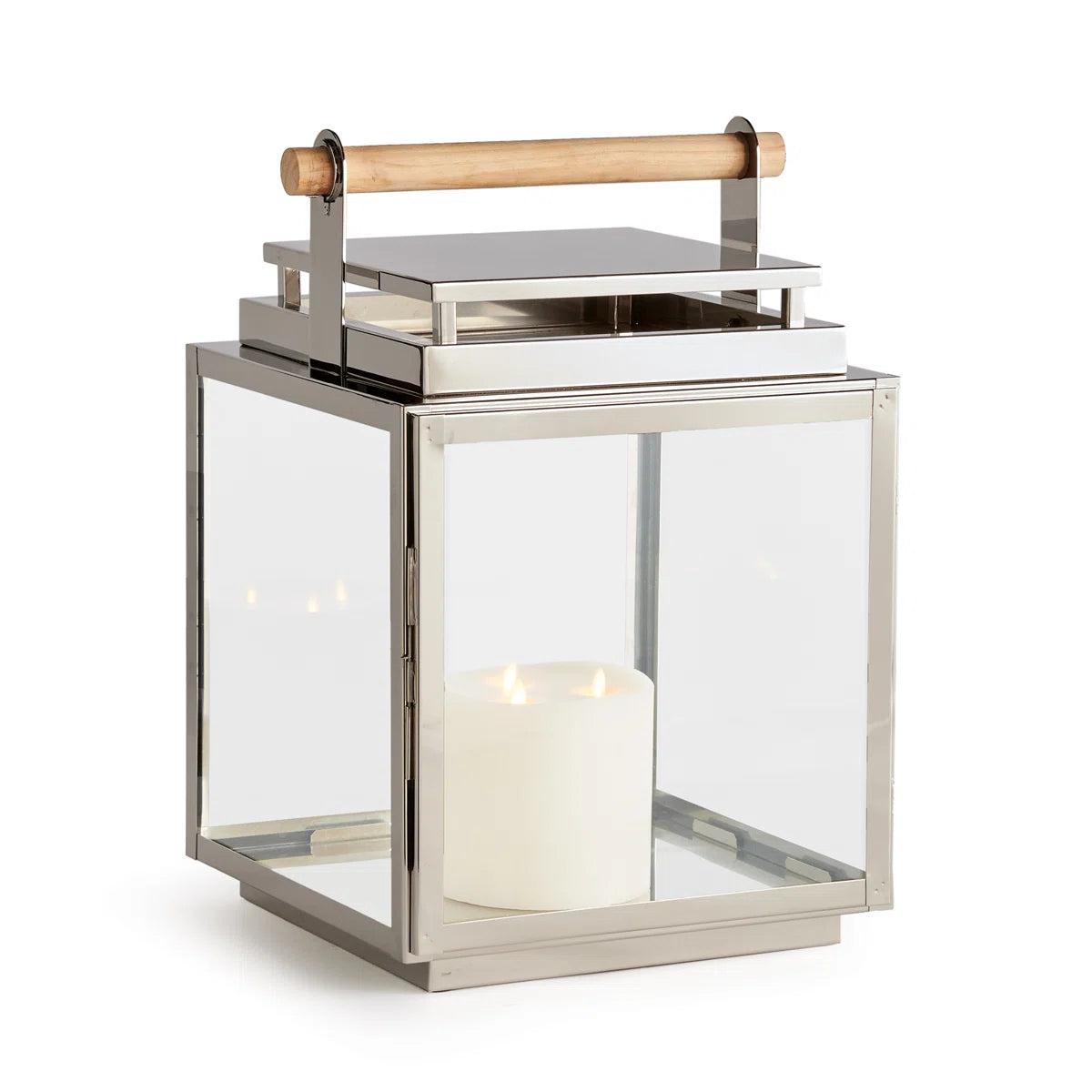 The Adwin Outdoor Lantern features a metal and glass design with a teak handle and includes a glowing white pillar candle inside.