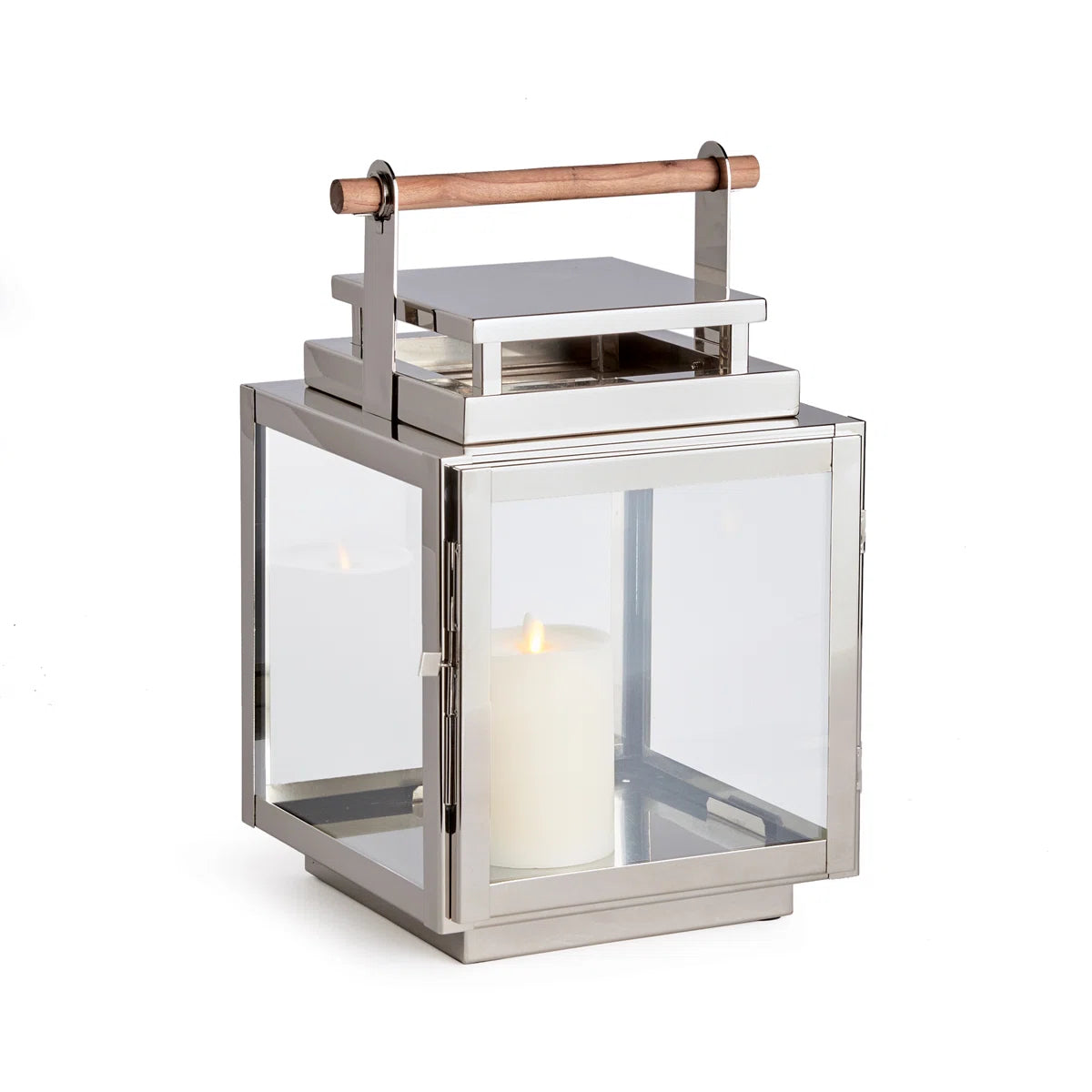 The Adwin Outdoor Lantern features a metal and glass design with a teak handle and houses a lit white pillar candle inside.