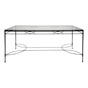 The Janus et Cie Amalfi Glass Top Dining Table in Slate features a rectangular shape and black metal frame, making it ideal for both lounge and dining areas.