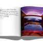 An open book with a picture of a pool and a quote in Assouline Style.