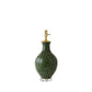 The Athens Large Green Dappled Lamp features a green ceramic base with a speckled pattern, gold hardware, and a clear round pedestal. Shown without a lampshade, it highlights artistic ceramic craftsmanship.