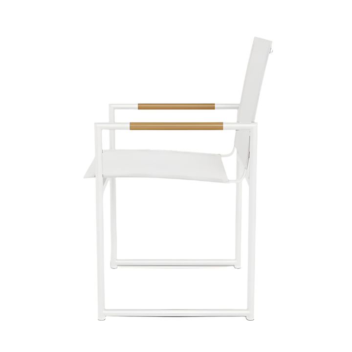 Side view of the Breeze Dining Chair in White Panama Blanco, featuring aluminum construction, a flat seat and back with all-weather Batyline sling, and wooden armrest accents.