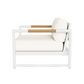 Side view of the Breeze XL Lounge Chair in White Panama Blanco, showcasing light wood armrests, a thick white cushion and backrest, and sleek aluminum construction.