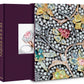 A close-up photo of a detailed jewelry design book cover featuring various precious stones and pearls, with another book titled "Boghossian: Expertise, Craftsmanship, Innovation" showcasing the work of master jewelers beside it.