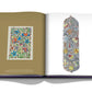 An open book displaying two pages with colorful floral and intricate patterns on both, one rectangular on the left and one elongated on the right, reminiscent of the exquisite craftsmanship of master jewelers like Boghossian: Expertise, Craftsmanship, Innovation adorning their creations with vibrant gemstones.