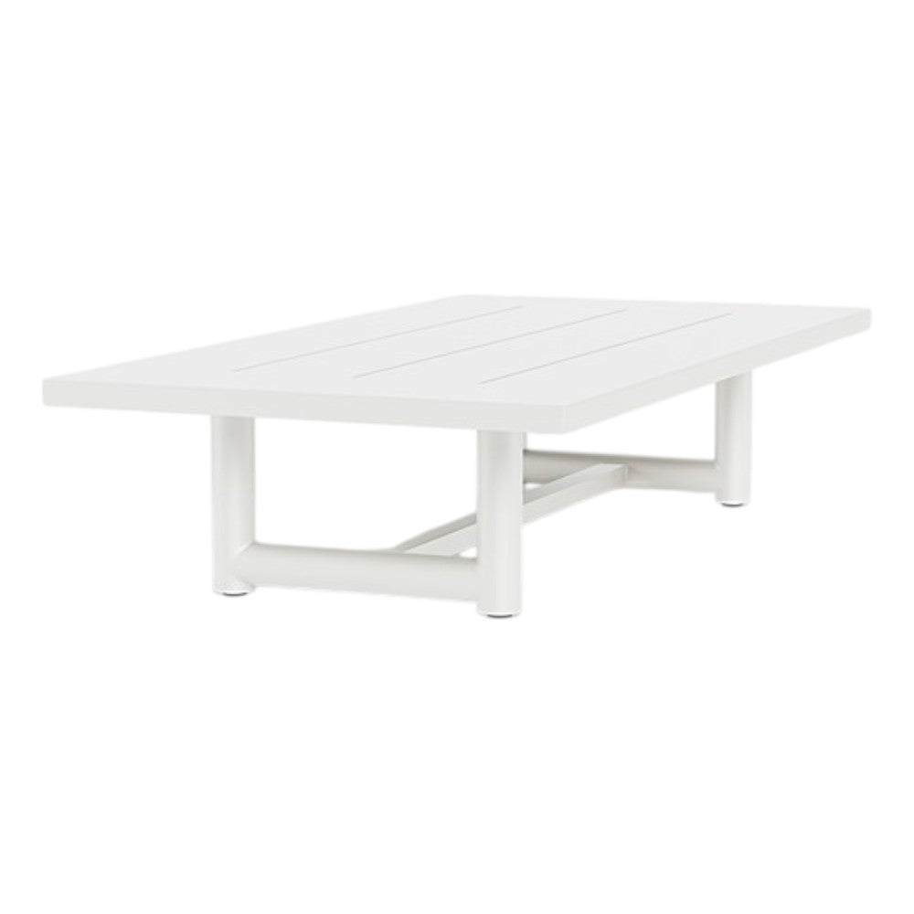 The Breeze XL Coffee Table in White features a rectangular flat top and sturdy tubular aluminum legs, showcasing a minimalist, modern design.