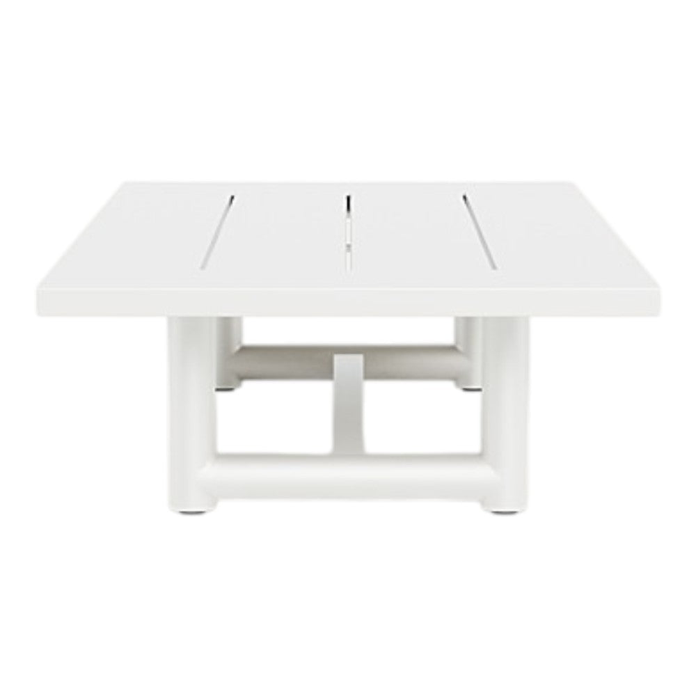 The Breeze XL Coffee Table in White features a rectangular slatted top and tubular aluminum legs, shown from the front against a plain background.