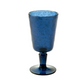 Featuring a captivating design from the Memento Acrylic Deep Blue Collection, this blue speckled drinking glass with a stem is perfect for enhancing your outdoor dining ambiance against a white backdrop.