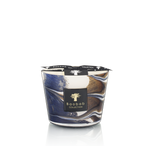 A Baobab Collection Delta Nil Candle in a glass container with a blue and brown marbled design, reminiscent of sea salt waves, capped with a black lid featuring white text and a logo.