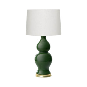 The Empire Table Lamp features a green ceramic rounded base with a brass-colored bottom and a white cylindrical fabric shade—an elegant choice for stylish entryway lighting.