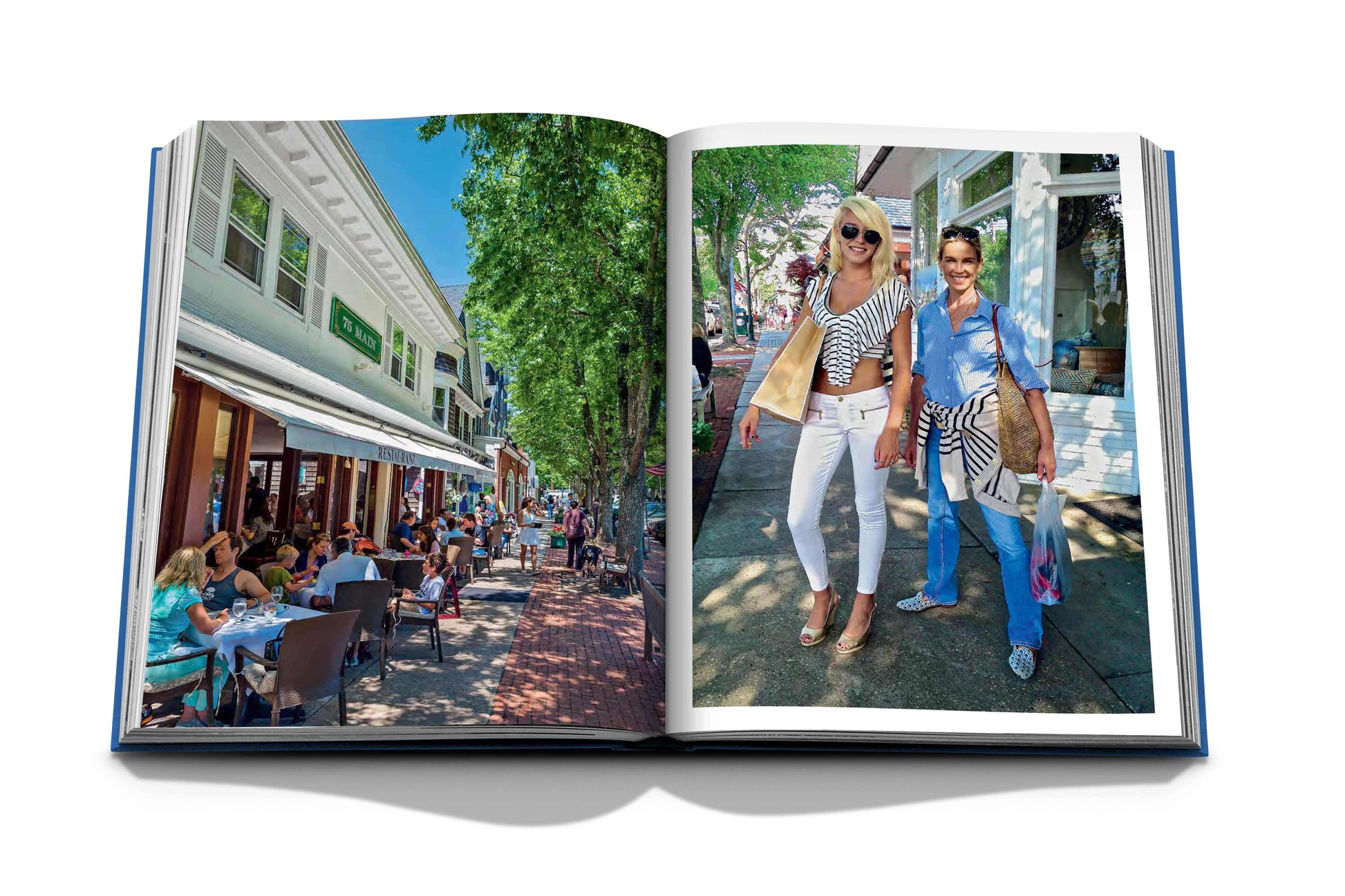 Open book showing two pages: left page depicts people dining at an outdoor café on a brick-paved street in The Hamptons; right page features two individuals posing for a photo while standing outdoors, exuding boho-chic luxury leisure. Hamptons Private.