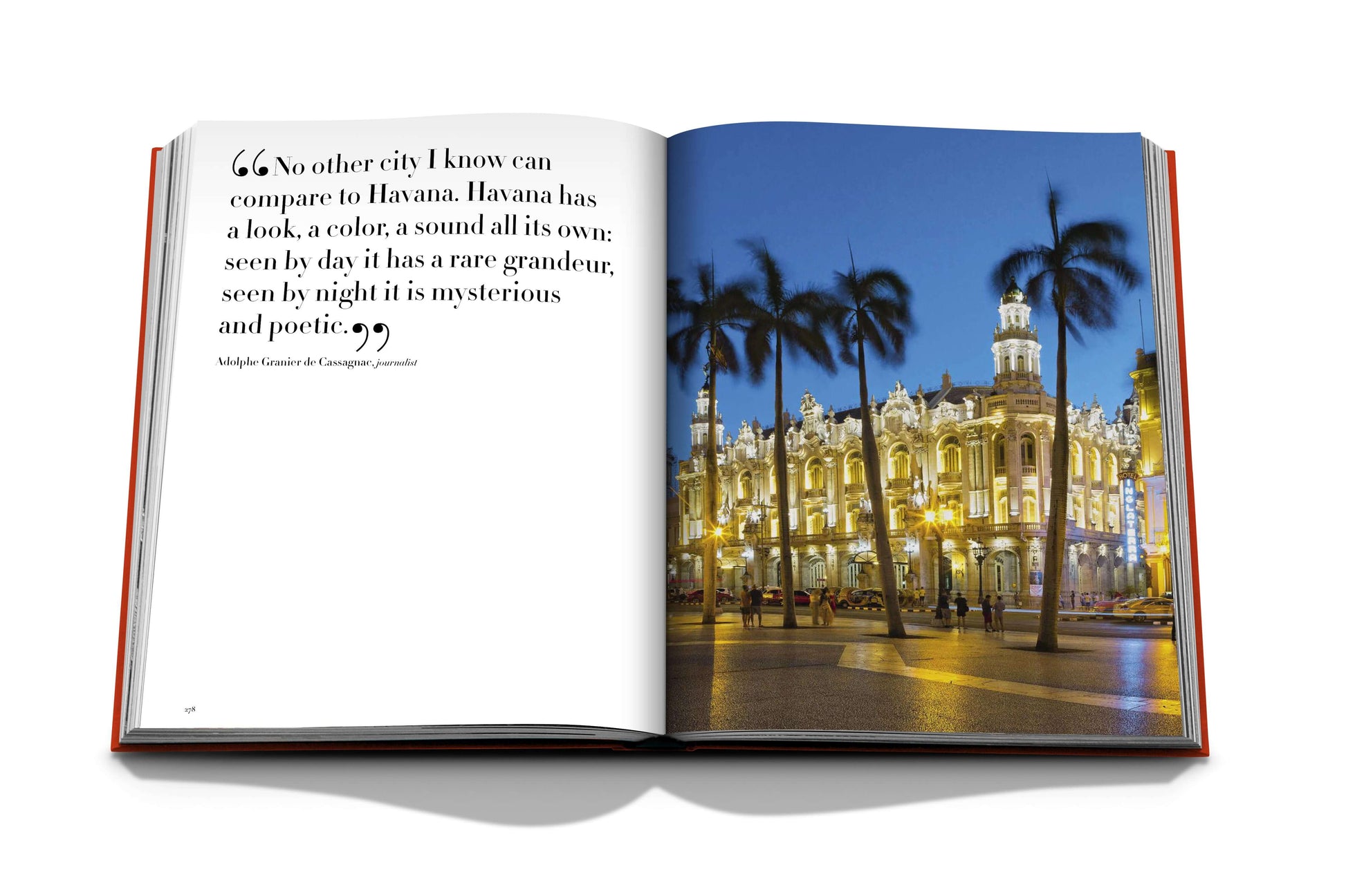 A hardcover book open to a page displaying a photograph of a lit-up, ornate building at night surrounded by palm trees, with text on the left page describing the unique charm of Havana Blues and its role in the Cuban revolution.