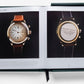 An open book displaying two pages with images of vintage wristwatches, one showing the front and the other the back. The book, with a dark green cover and a black ribbon bookmark, features detailed descriptions of each collected watch label, including some rare Rolex models.