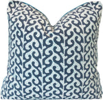 The Breach Candy Blue Pillow is a custom-made square decorative pillow with a navy blue background, white wavy abstract pattern, centered pointed top, and visible seams for an elegant finish. Crafted from premium materials.