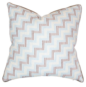 The Ziggy Sky Pillow is a custom-made square decorative pillow featuring a light blue and white zigzag pattern with vertical brown lines at each angle on a crisp white background.