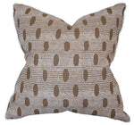 The Abacus Walnut Reverse Pillow features a brown and white geometric dot pattern, slightly pointed corners, and a textured fabric finish—meticulously crafted for a stylish accent to any space.
