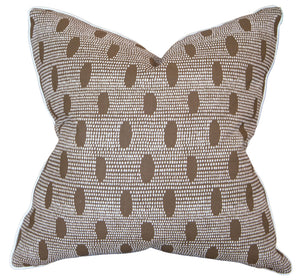 The Abacus Walnut Reverse Pillow features a brown and white geometric dot pattern, slightly pointed corners, and a textured fabric finish—meticulously crafted for a stylish accent to any space.
