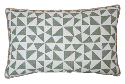 The Circus Lumbar Pillow is a custom-made rectangular pillow featuring a green and white geometric triangle pattern and finished with beige piping around the edges.