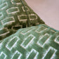 Close-up of two Chambord Velvet Leaf Pillows, custom-made in green velvet with a soft surface and textured geometric white pattern.