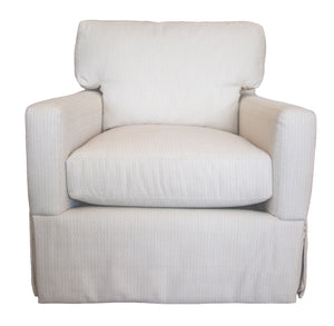 The Blair Swivel Chair is shown from the front, featuring light beige upholstery, plush cushioned seating, a contemporary square back and arms, and a tailored skirt at the base.