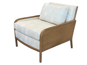 Stinson Lounge Chair in Napa White features a wood-framed design with luxurious light beige textured upholstery and an angled backrest, shown from the front left angle.