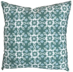 The Mindra Moss Outdoor Pillow features a green background with a white and light blue geometric pattern, making it an ideal accent for your sofa or bed.