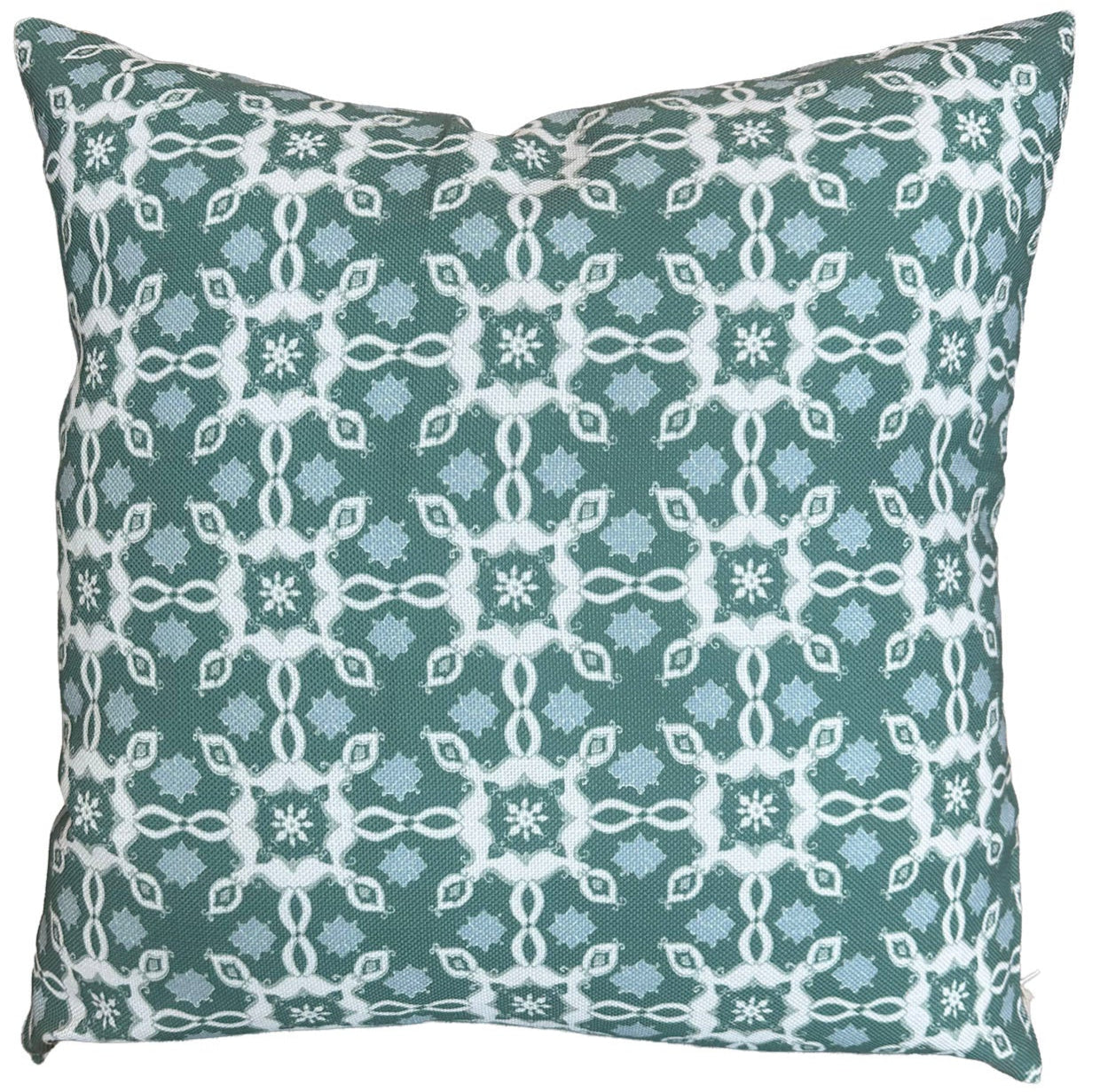 The Mindra Moss Outdoor Pillow features a green background with a white and light blue geometric pattern, making it an ideal accent for your sofa or bed.